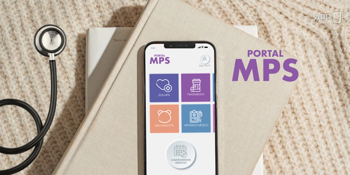Celular com o aplicativo MPS em tela e em cima de um livro